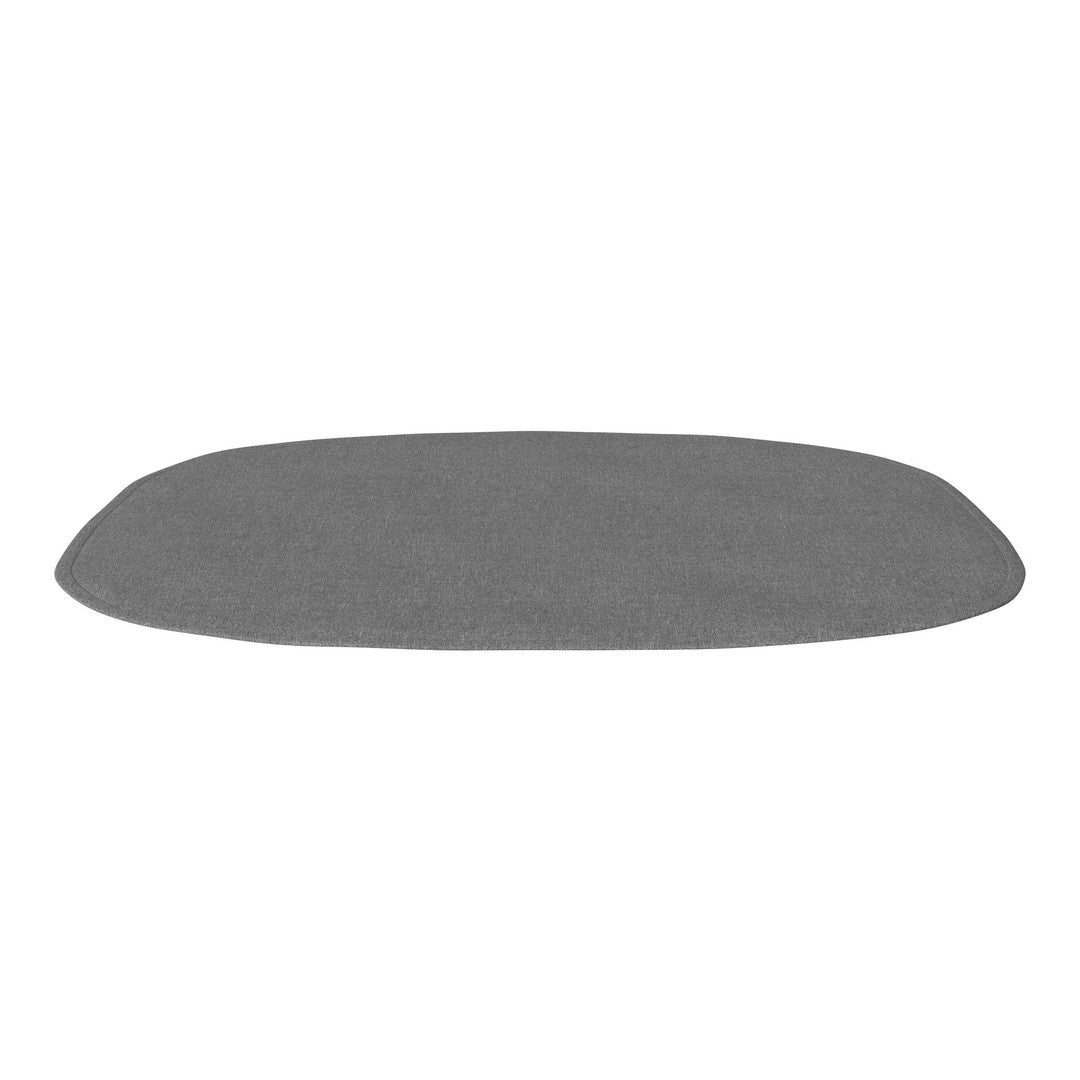 Gray, textured mat in an oval shape with a smooth, modern design, perfect for contemporary decor.
