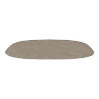 Beige oval mat with a subtle woven texture, perfect for a warm and inviting decor. Ideal for any room.