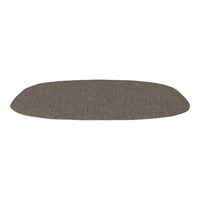 Soft brown oval mat with a textured surface, perfect for adding warmth to any space.