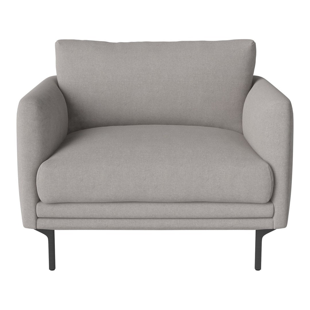 Gray upholstered armchair with a minimalist design and soft, smooth texture on metal legs.