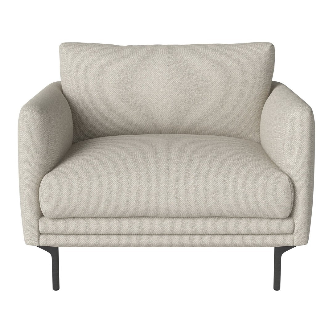 Light beige armchair with smooth fabric and subtle pattern, featuring black metal legs for a modern touch.
