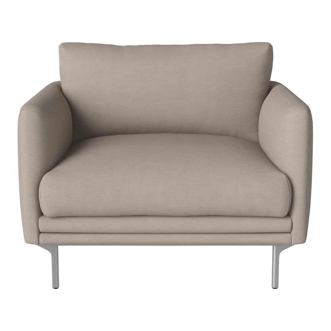 Beige upholstered armchair with smooth fabric texture and minimalist design on sleek metal legs.
