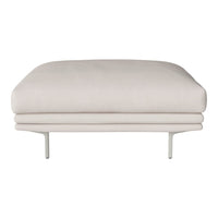 Light beige ottoman with smooth upholstery and sleek metal legs, perfect for modern decor.