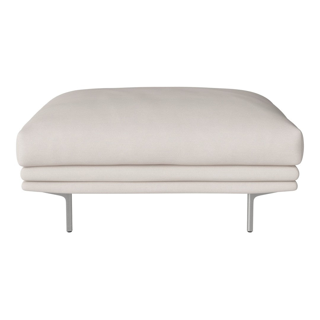 Beige upholstered ottoman with a smooth, minimalist design and sleek silver legs. Simple, modern aesthetic.