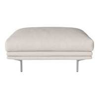 Beige upholstered ottoman with a smooth, minimalist design and sleek silver legs. Simple, modern aesthetic.