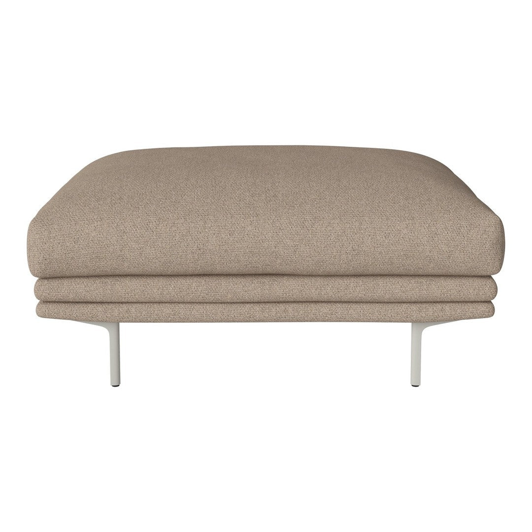 Beige upholstered ottoman with a smooth, rounded design and sleek silver legs, perfect for modern decor.