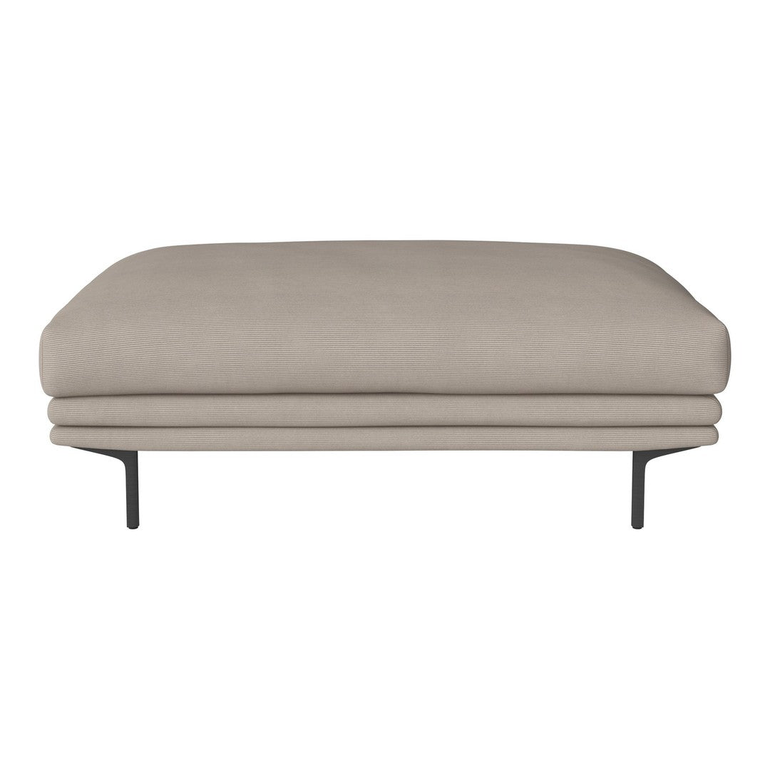 Beige upholstered sofa with a smooth, textured surface and sleek black metal legs, minimalist design.