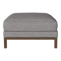 Gray upholstered ottoman with a textured finish and a wooden base, perfect for modern decor.