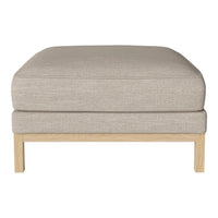 Light beige upholstered ottoman with a smooth, plain fabric and natural wood legs. Modern and minimalist design.