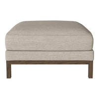 Beige upholstered ottoman with a smooth, minimalist design and wooden legs, perfect for versatile home decor.