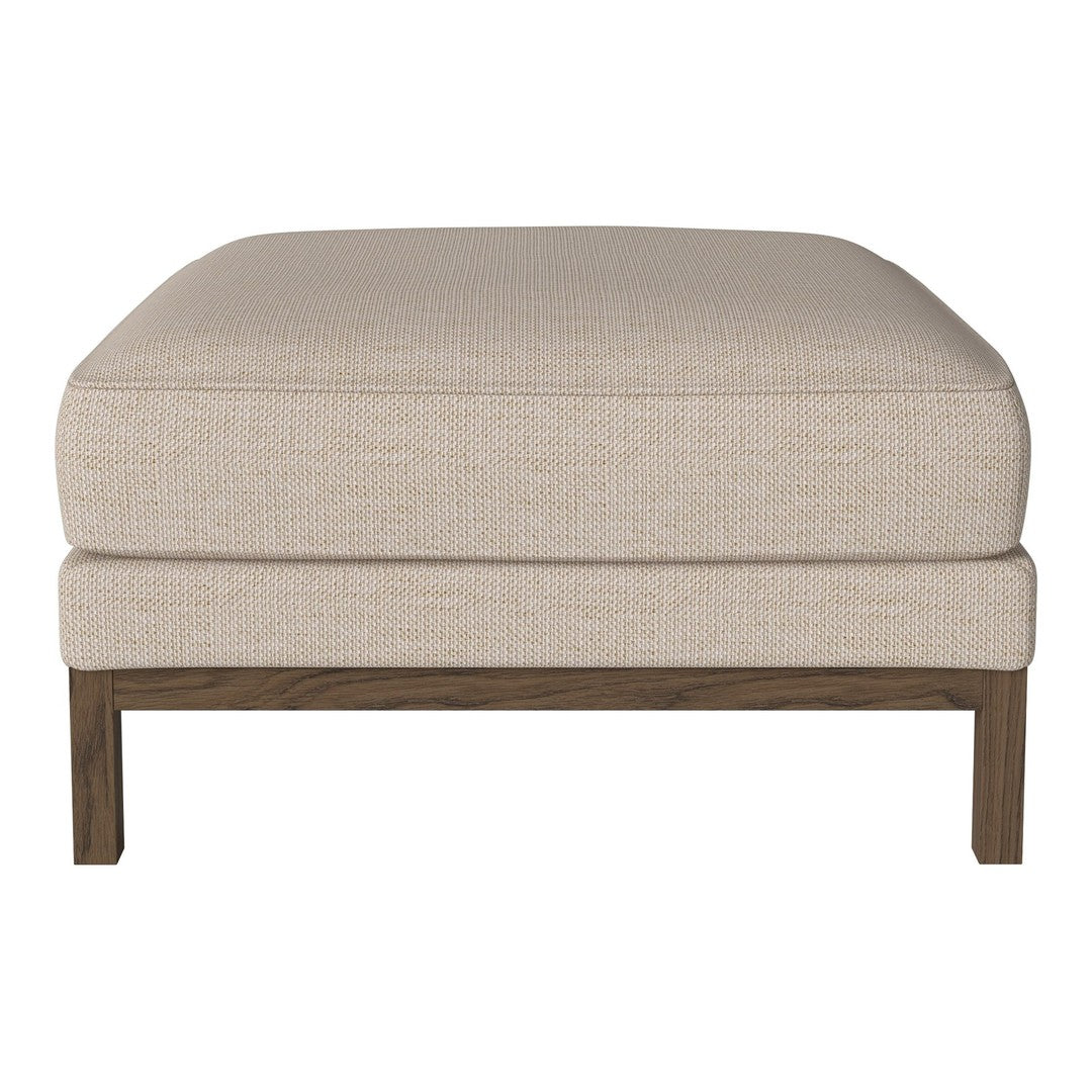 Beige upholstered ottoman with a smooth texture and wooden legs, perfect for contemporary decor.