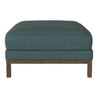 Teal upholstery with a textured pattern and light wood legs. Modern ottoman design for contemporary decor.