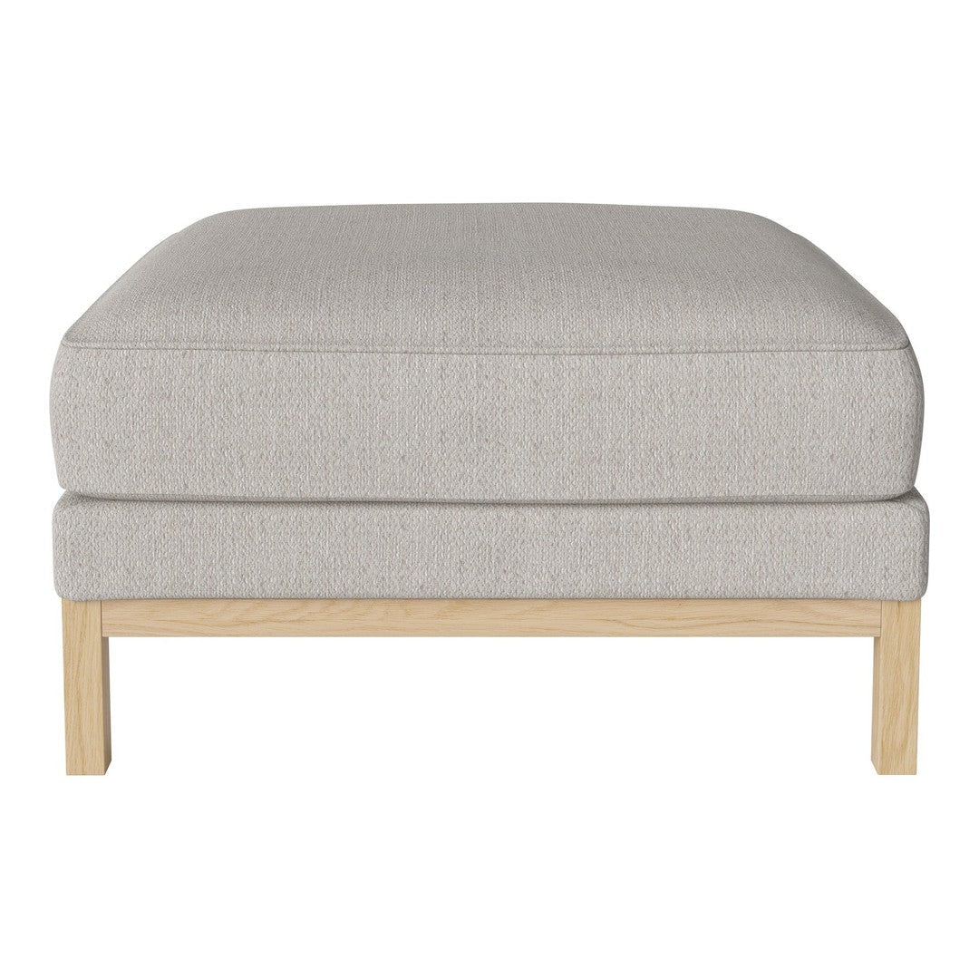 Light grey upholstered ottoman with a smooth texture and natural wood base. Perfect for modern home decor.