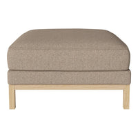 Beige upholstered ottoman with a textured fabric and light wood base. Perfect for minimalist or modern decor.