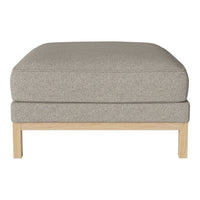 Light gray upholstered ottoman with a smooth texture and natural wood legs, perfect for modern decor.
