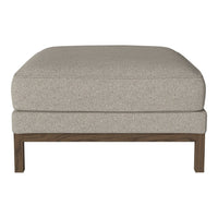 Beige upholstered ottoman with a smooth texture and wooden base, perfect for versatile home decor.