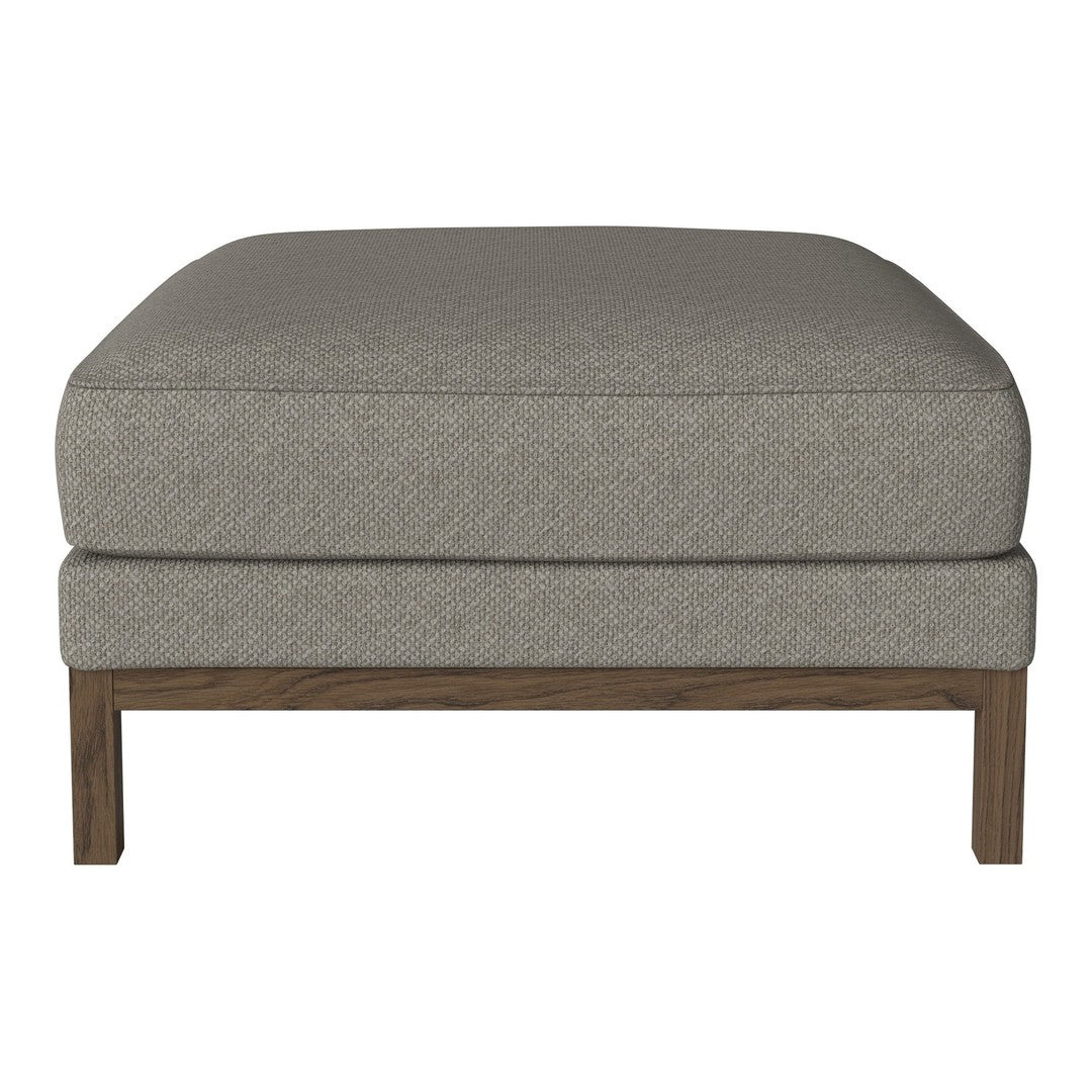 Gray upholstered ottoman with a textured fabric and wooden legs, offering a modern and minimalist design.