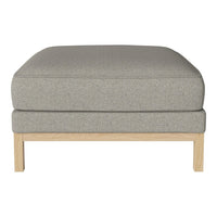 Gray upholstered ottoman with a subtle textured pattern and light wood legs. Perfect for modern decor.