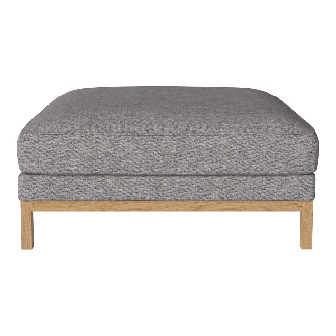 Gray linen ottoman with a smooth texture and light wooden legs, perfect for modern living spaces.