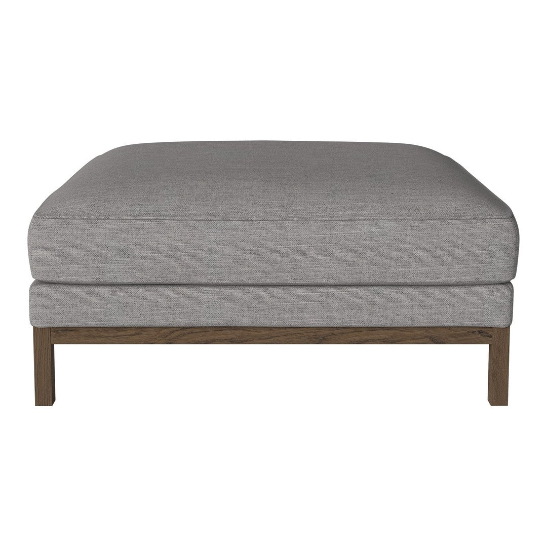 Gray upholstered ottoman with a modern design, featuring a sleek wooden base and a minimalist pattern.
