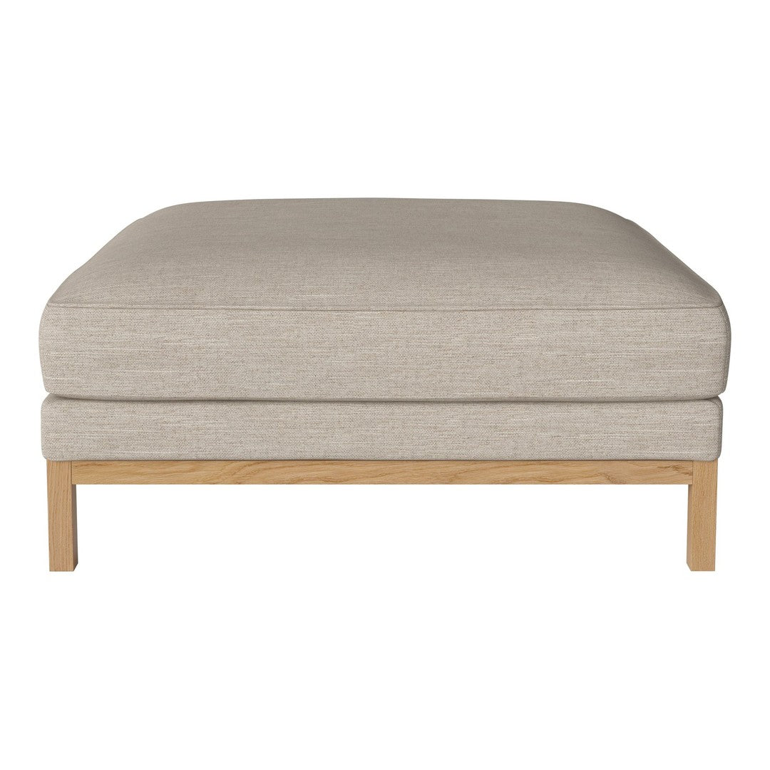 Beige upholstered ottoman with a smooth texture and light wooden legs, minimalist design for modern decor.