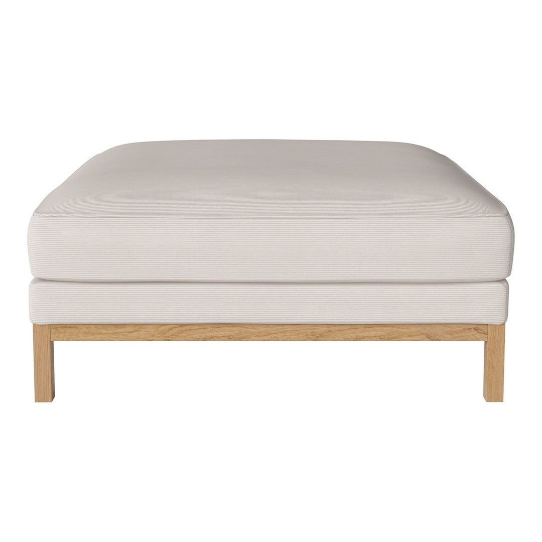 Cream-colored ottoman with a minimalist design and light wood legs, perfect for modern decor.