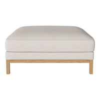 Cream-colored ottoman with a minimalist design and light wood legs, perfect for modern decor.