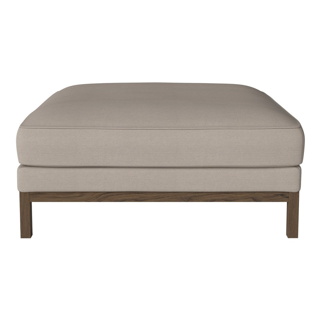 Beige upholstered ottoman with a smooth texture and a natural wood base. Simple, modern design for versatile decor.