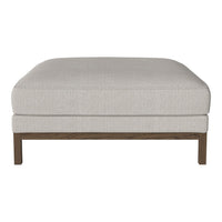 Light beige upholstered ottoman with a smooth texture and wooden legs, featuring a simple and modern design.