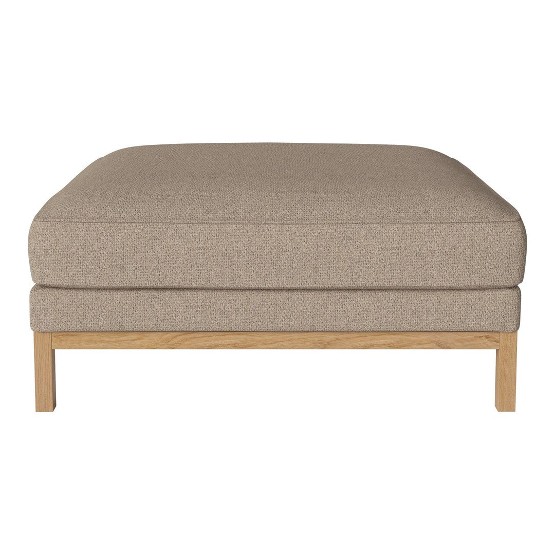Beige upholstered ottoman with a smooth texture and natural wood legs, minimalistic design. Perfect for modern decor.