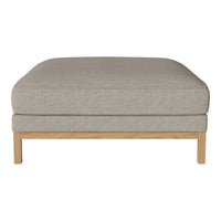 Gray upholstered ottoman with a smooth texture and light wooden legs. Modern, minimalist design for versatile decor.