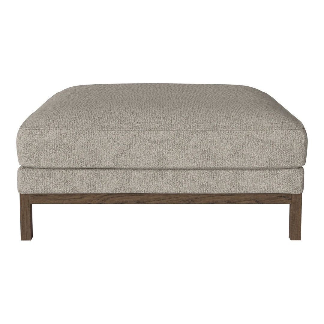 Light gray upholstered ottoman with a smooth texture and wooden legs, perfect for modern decor.