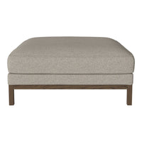 Light gray upholstered ottoman with a smooth texture and wooden legs, perfect for modern decor.