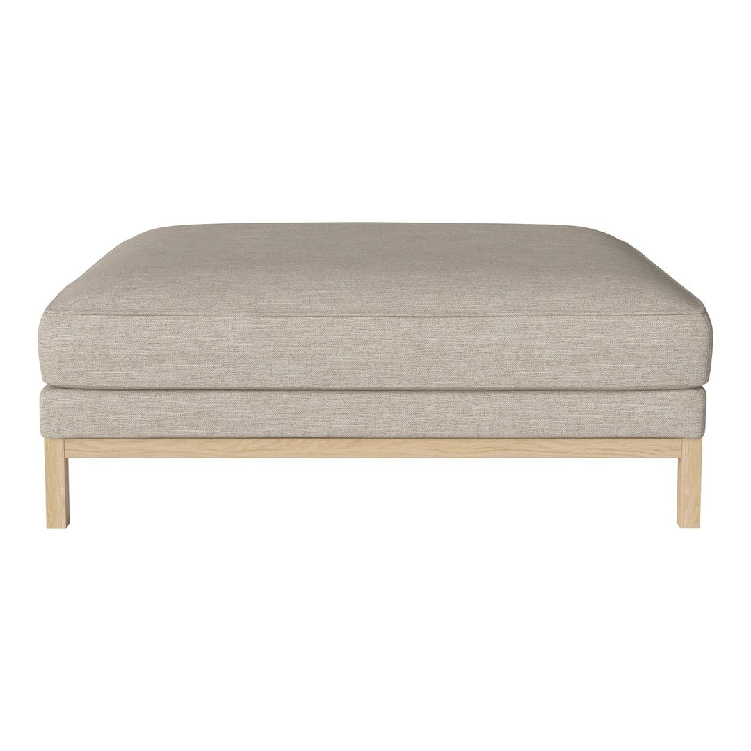 Beige upholstered ottoman with a clean, minimalist design and light wooden legs. Ideal for modern decor.