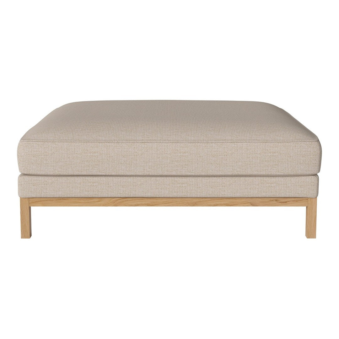 Beige upholstered ottoman with a subtle textured pattern and a light wood frame. Perfect for modern living spaces.