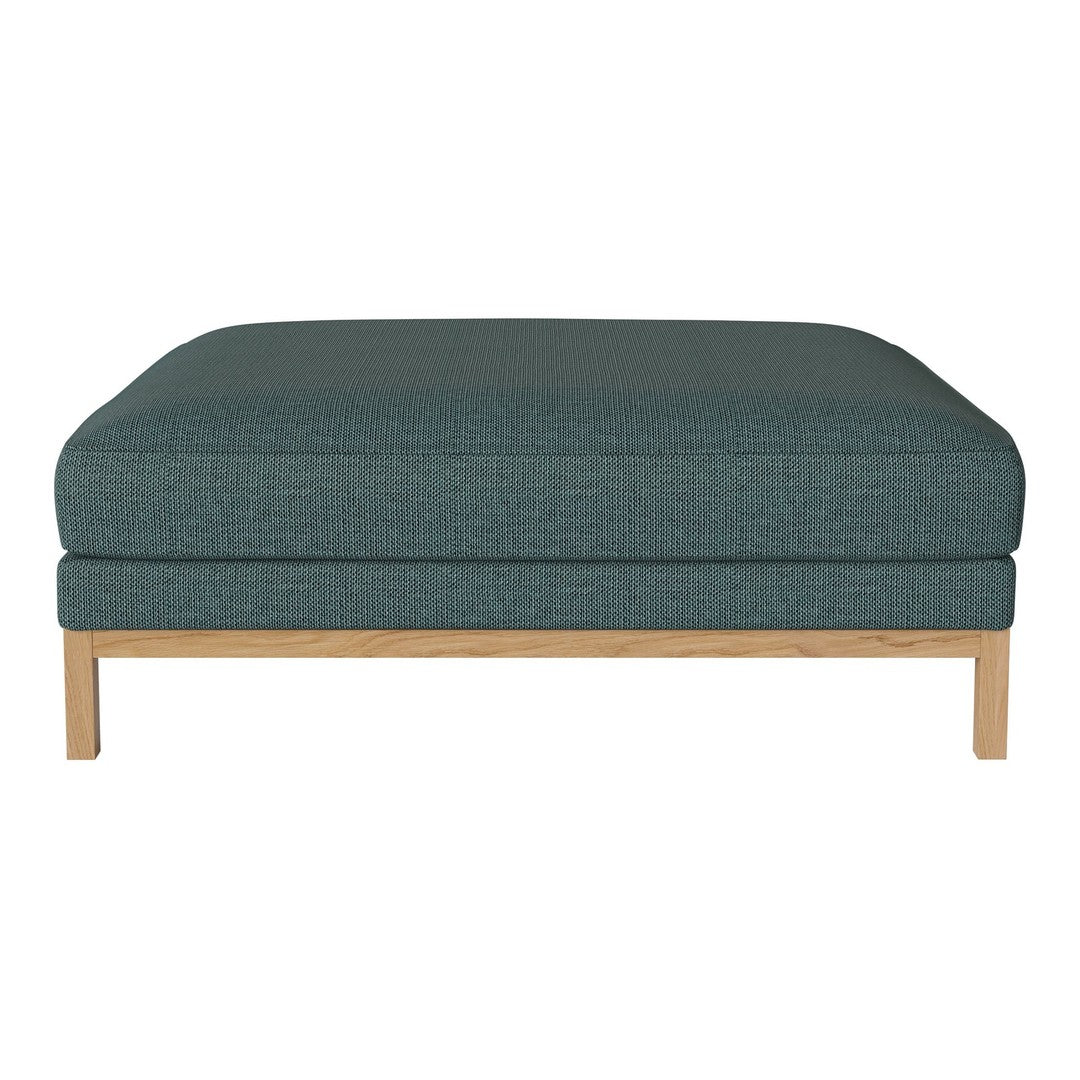 Teal upholstered ottoman with subtle texture and light wood legs, perfect for contemporary decor.