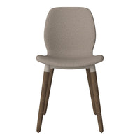 Beige upholstered chair with textured pattern and light wood legs. Modern design for versatile home decor.
