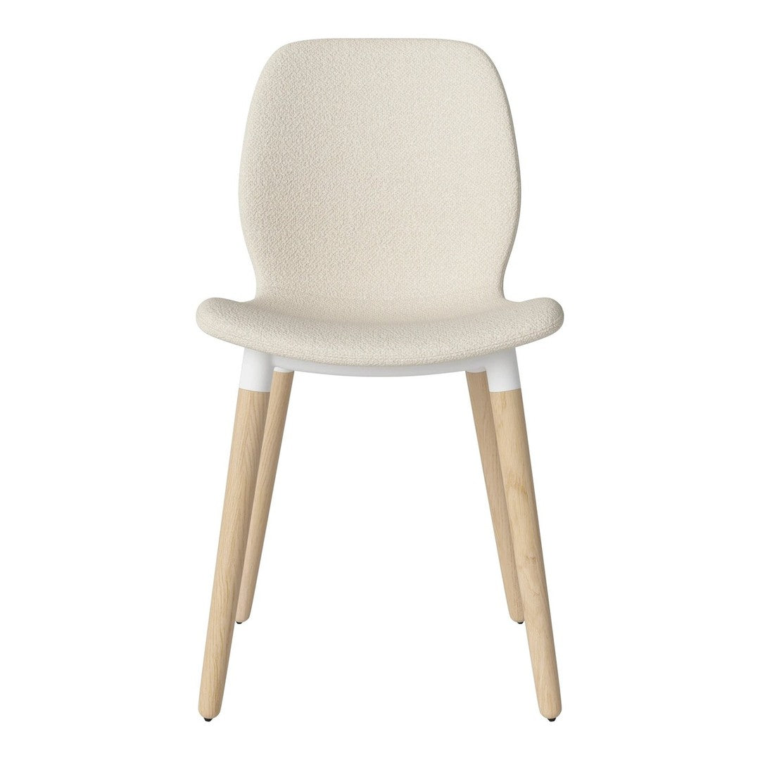 Cream-colored chair with a textured fabric seat and light wooden legs, minimalistic design.