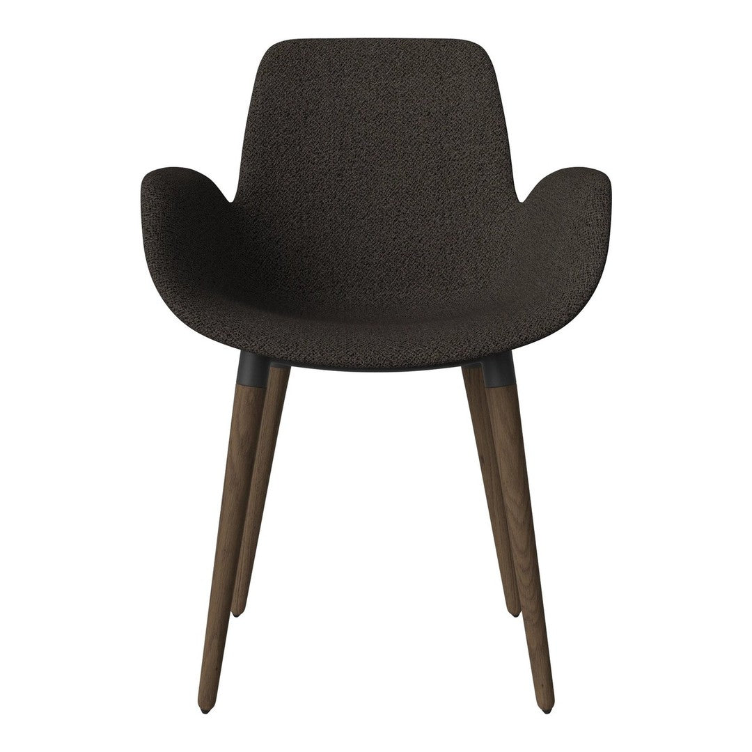 Brown upholstered chair with wooden legs, featuring a smooth, minimalist design. Ideal for modern interiors.