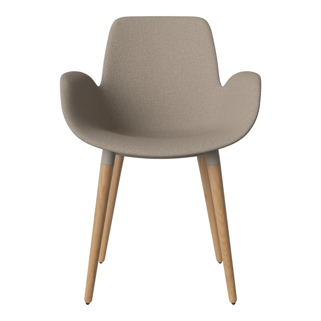 Beige fabric armchair with natural wood legs, featuring a sleek modern design and simple clean lines.