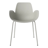 Modern white chair with smooth, curved contours and minimalist metal legs for a sleek look.