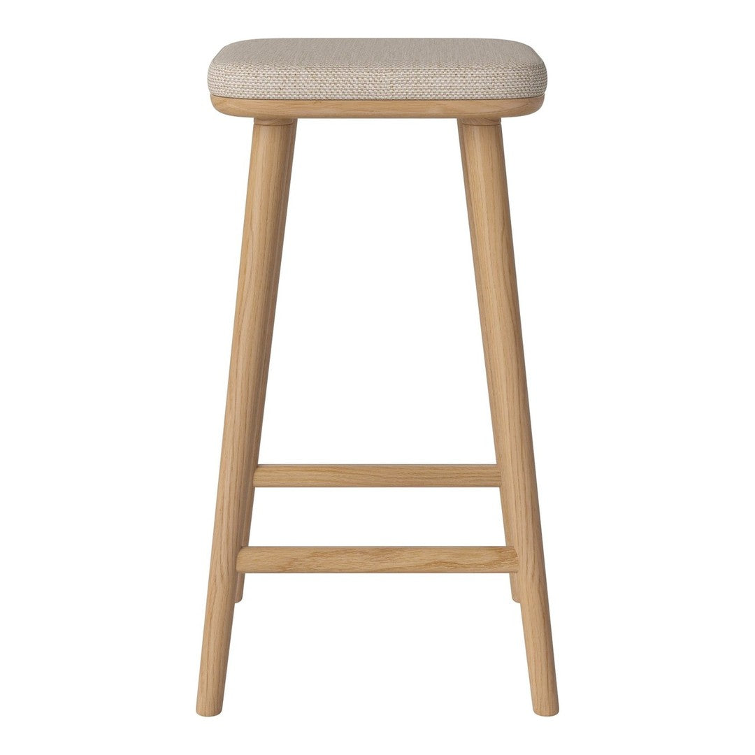 Light beige upholstered bar stool with natural wooden legs. Simple, modern design ideal for various decor styles.