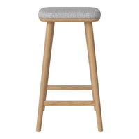 Light gray upholstered seat with natural wood legs, featuring a simple, minimalist design.