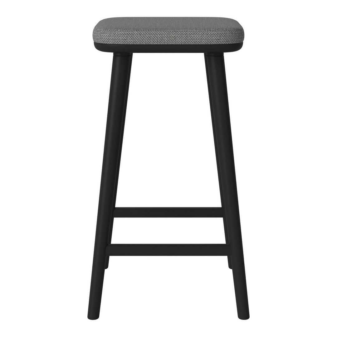 Black wooden stool with a subtle gray upholstered seat, emphasizing a modern, minimalist design.