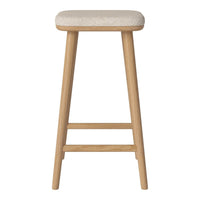 Light beige upholstered seat on natural wood legs, minimalist design with no visible patterns. Perfect for modern spaces.