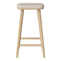 Light beige upholstered stool with natural wooden legs, featuring a simple and modern design.