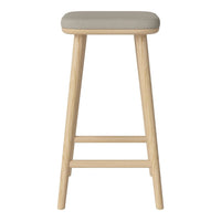 Light gray padded seat on natural wood legs, minimalist design with no visible patterns. Perfect for modern decor.