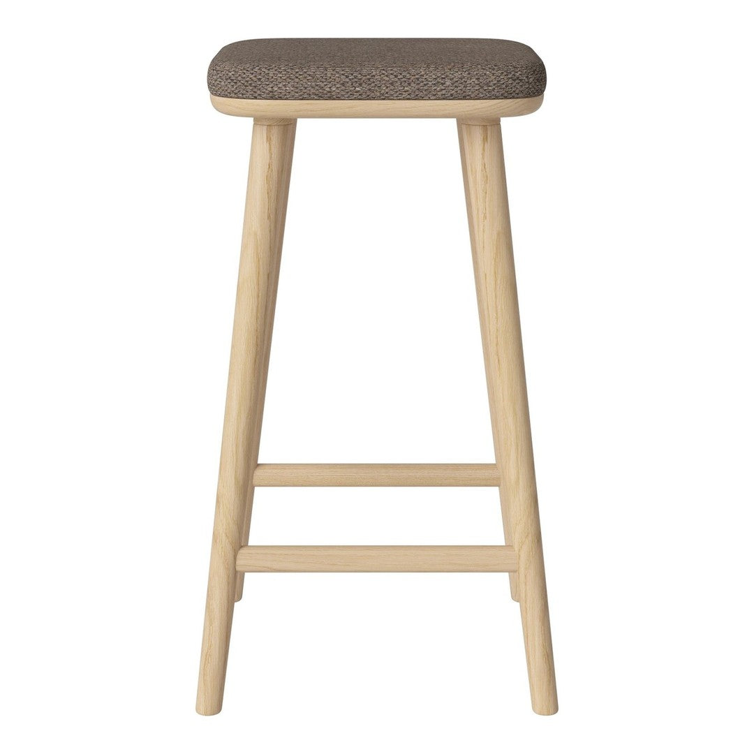 Light wood stool with a solid tan upholstered seat, featuring a sleek, minimalist design.