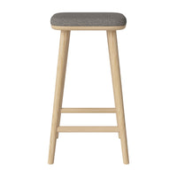 Gray patterned seat with light wooden legs, minimalist design for modern decor. Perfect for kitchens or bars.