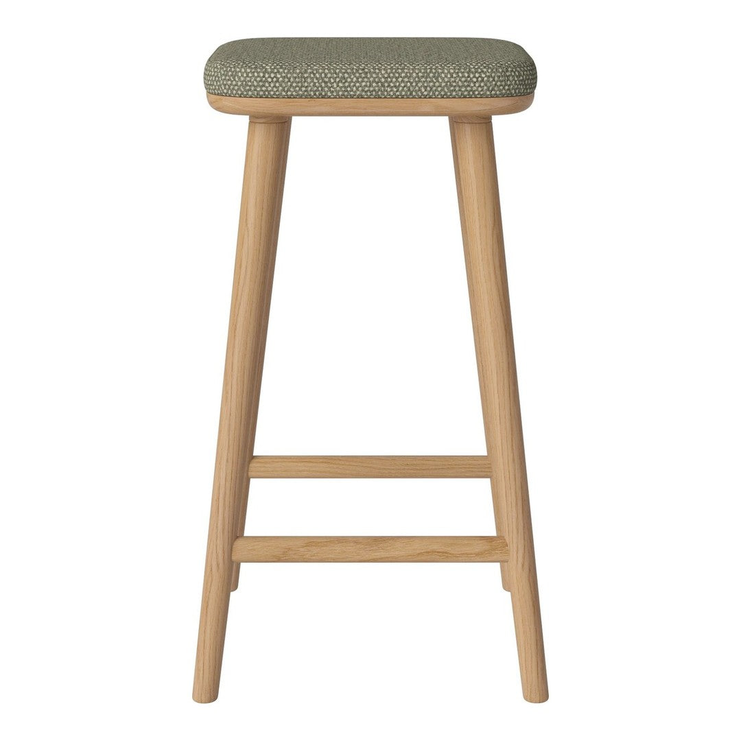 Green patterned upholstery on a wooden bar stool with natural finish legs. Perfect for modern or rustic decor.
